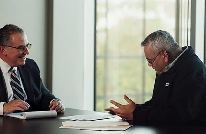 Image (Attorneys consulting with a client)